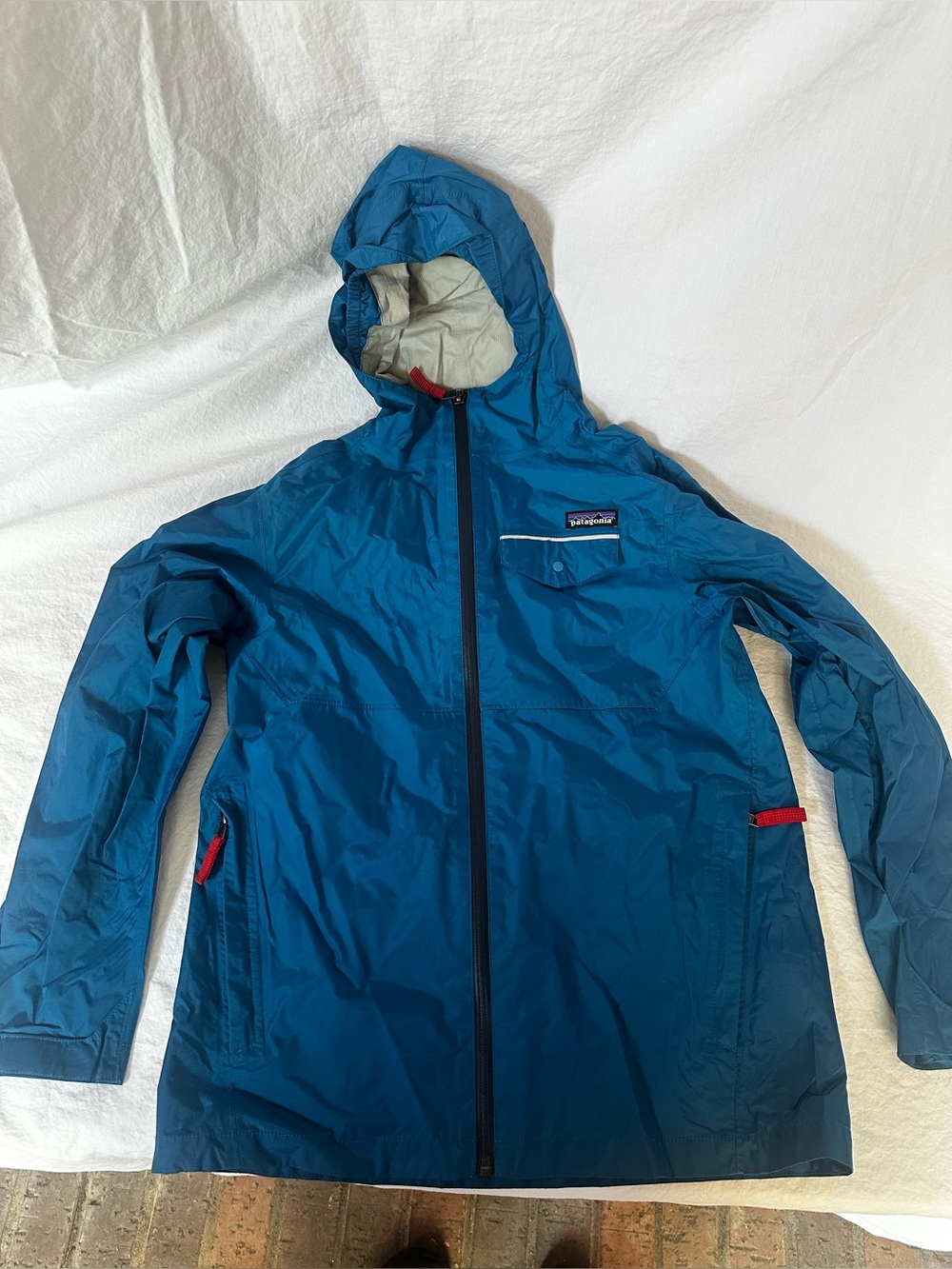 Patagonia Kids Teal Hooded Raincoat with Red Accents
